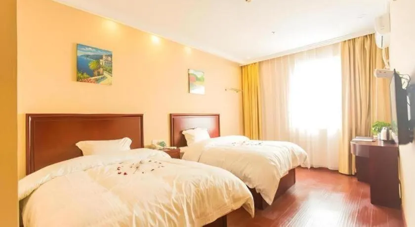 Bed in GreenTree Inn Taizhou New District Hospital of Renmin Hospital Mingliu Express Hotel