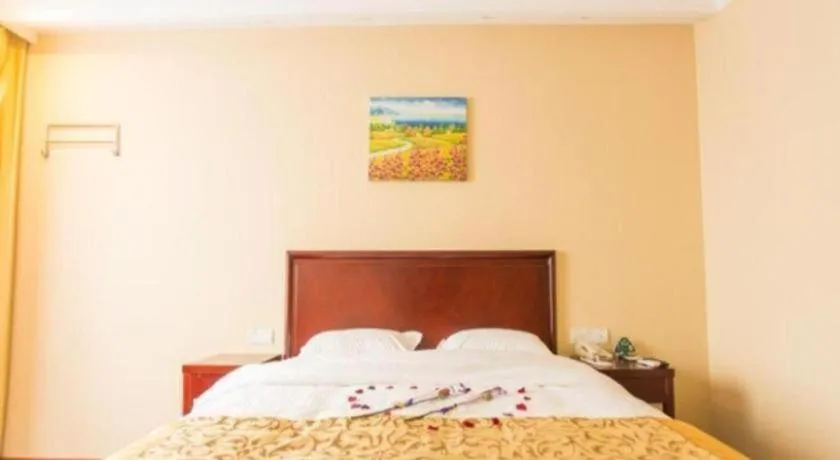 Bed in GreenTree Inn Taizhou New District Hospital of Renmin Hospital Mingliu Express Hotel