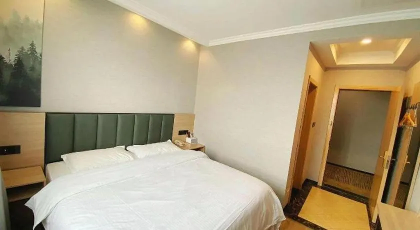 Bed in GreenTree Inn Taizhou New District Hospital of Renmin Hospital Mingliu Express Hotel