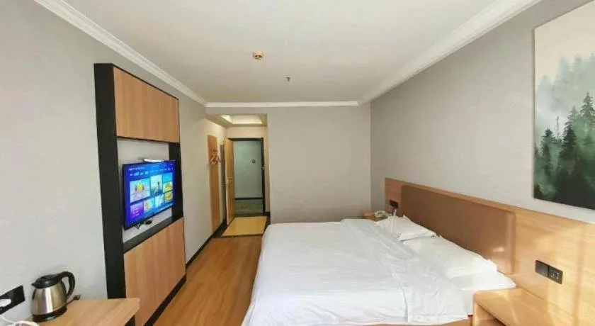 Bed in GreenTree Inn Taizhou New District Hospital of Renmin Hospital Mingliu Express Hotel