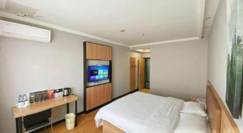 Bed in GreenTree Inn Taizhou New District Hospital of Renmin Hospital Mingliu Express Hotel