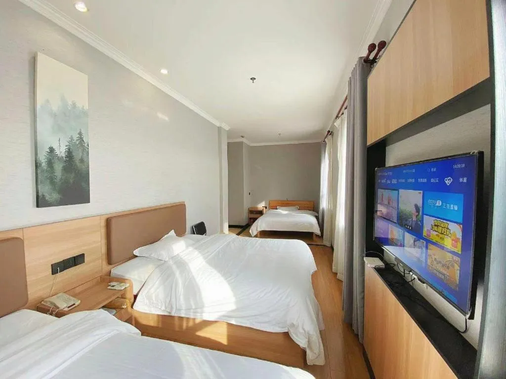 Bed in GreenTree Inn Taizhou New District Hospital of Renmin Hospital Mingliu Express Hotel