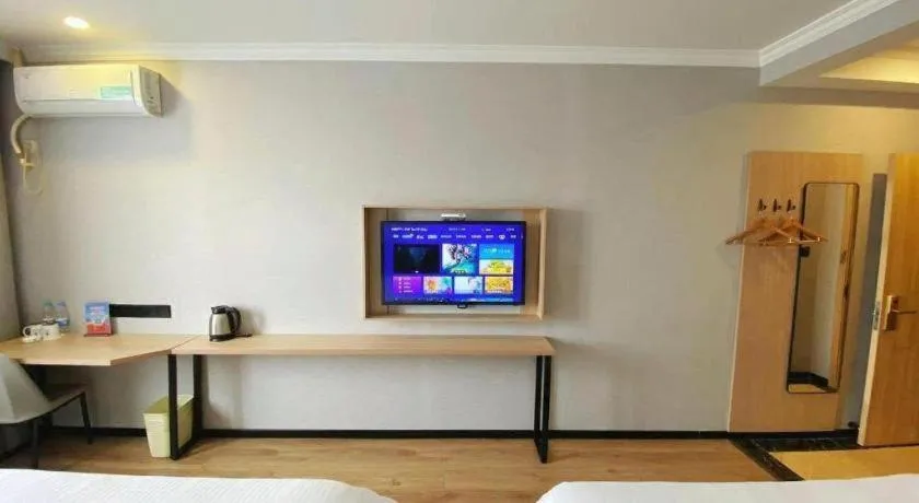 Bed in GreenTree Inn Taizhou New District Hospital of Renmin Hospital Mingliu Express Hotel