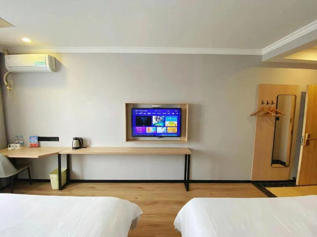 Bed in GreenTree Inn Taizhou New District Hospital of Renmin Hospital Mingliu Express Hotel