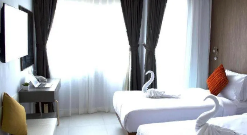 Bed in Elegancy Sansabai Hotel