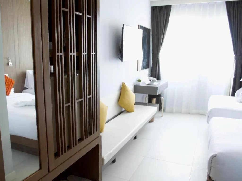 Bed in Elegancy Sansabai Hotel