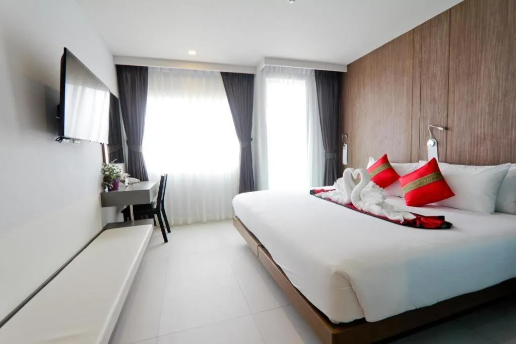 Bed in Elegancy Sansabai Hotel