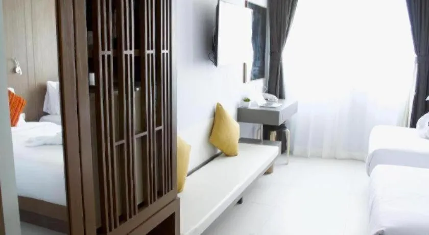 Bed in Elegancy Sansabai Hotel