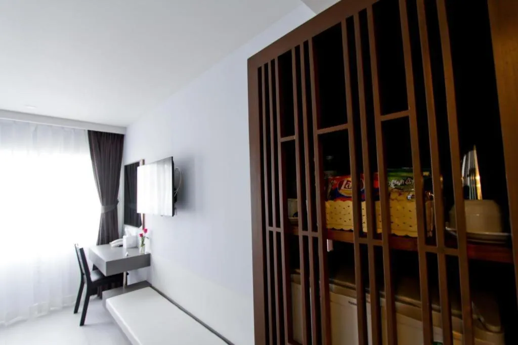 Bed in Elegancy Sansabai Hotel