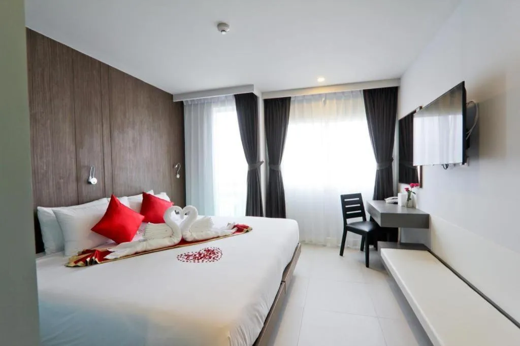 Bed in Elegancy Sansabai Hotel