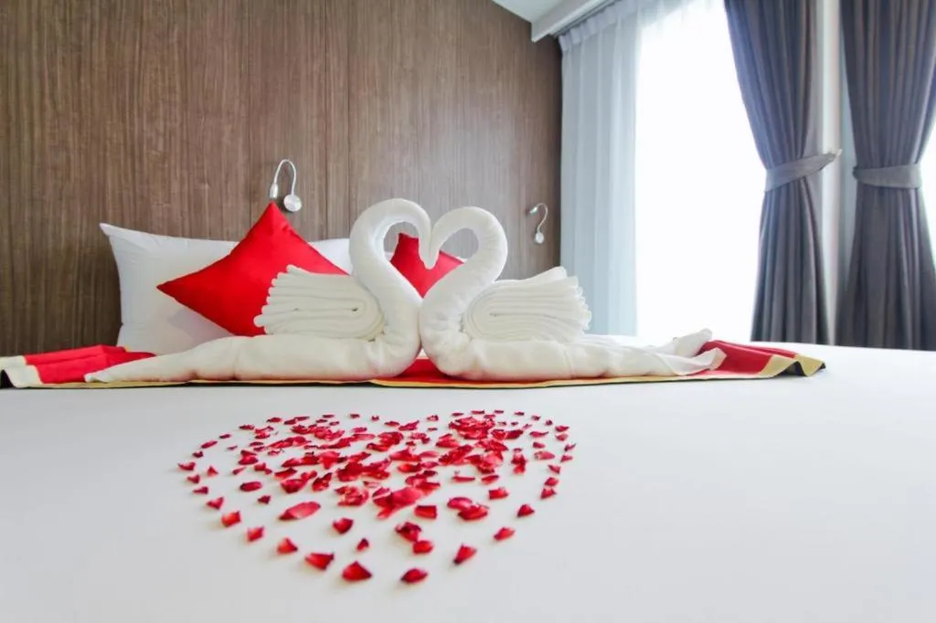 Bed in Elegancy Sansabai Hotel