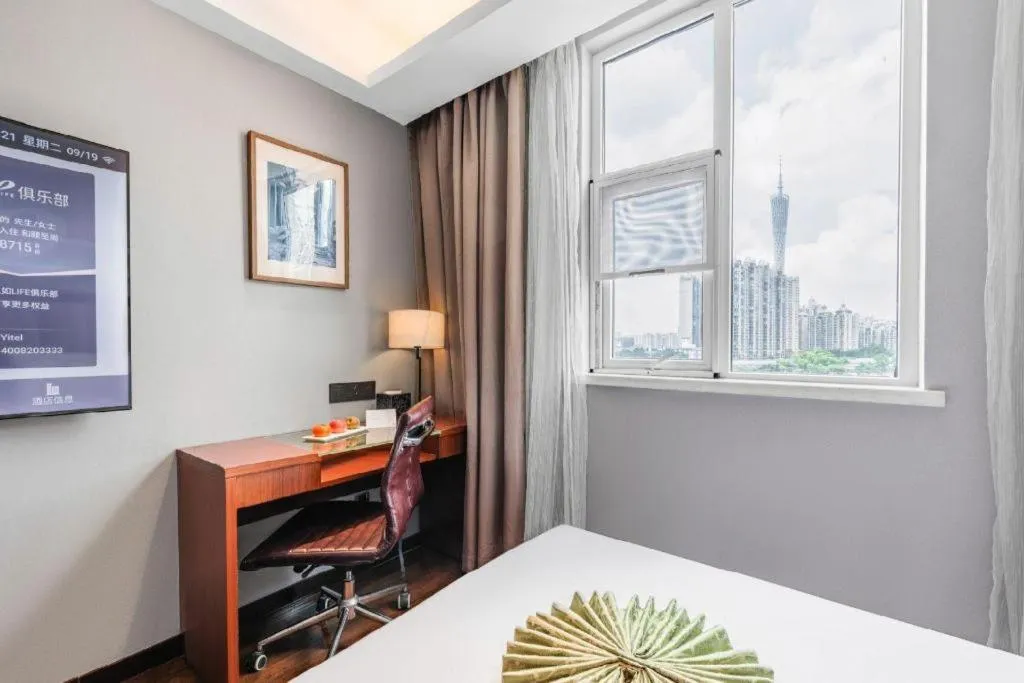 Bed in Yitel Guangzhou Pazhou Exhibition Center Chigang Metro Station