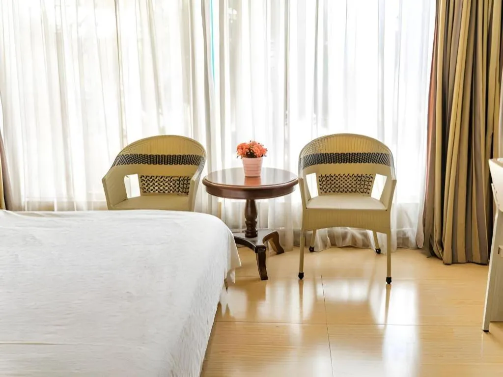 Bed in Jian Guo Grand Hotel