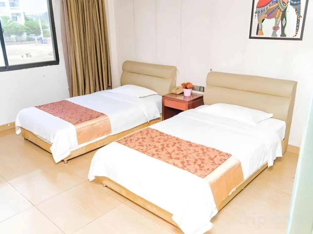 Bed in Jian Guo Grand Hotel