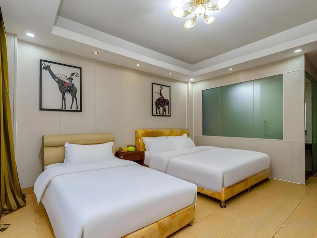 Bed in Jian Guo Grand Hotel