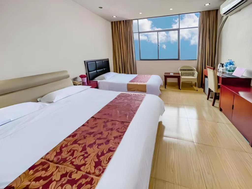 Bed in Jian Guo Grand Hotel