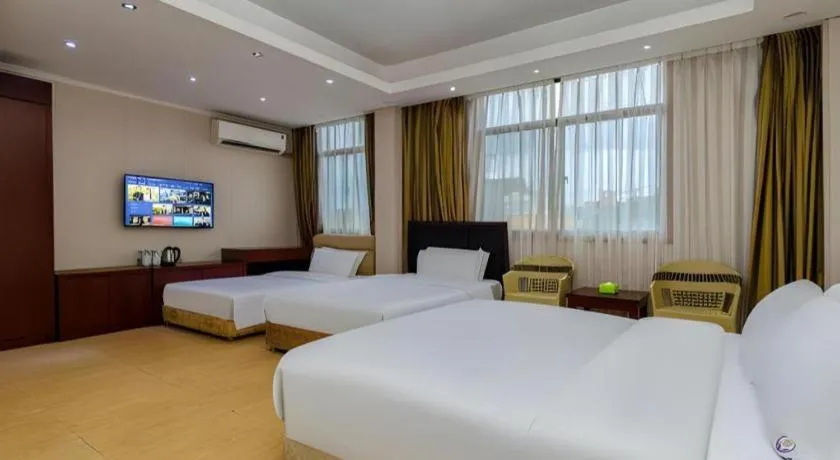 Bed in Jian Guo Grand Hotel