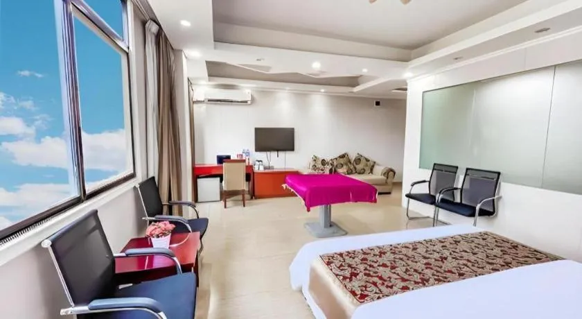 Bed in Jian Guo Grand Hotel