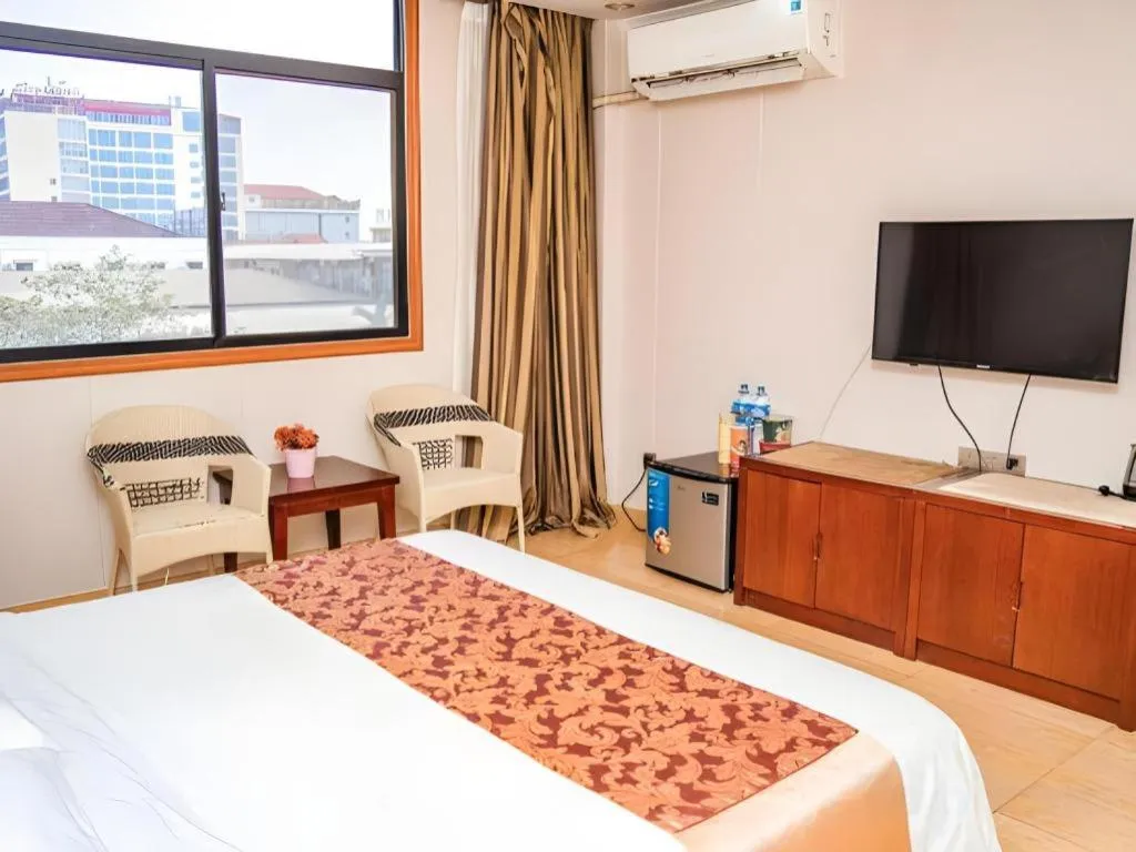 Bed in Jian Guo Grand Hotel