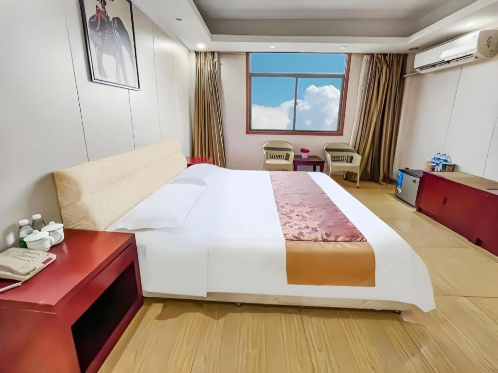 Bed in Jian Guo Grand Hotel