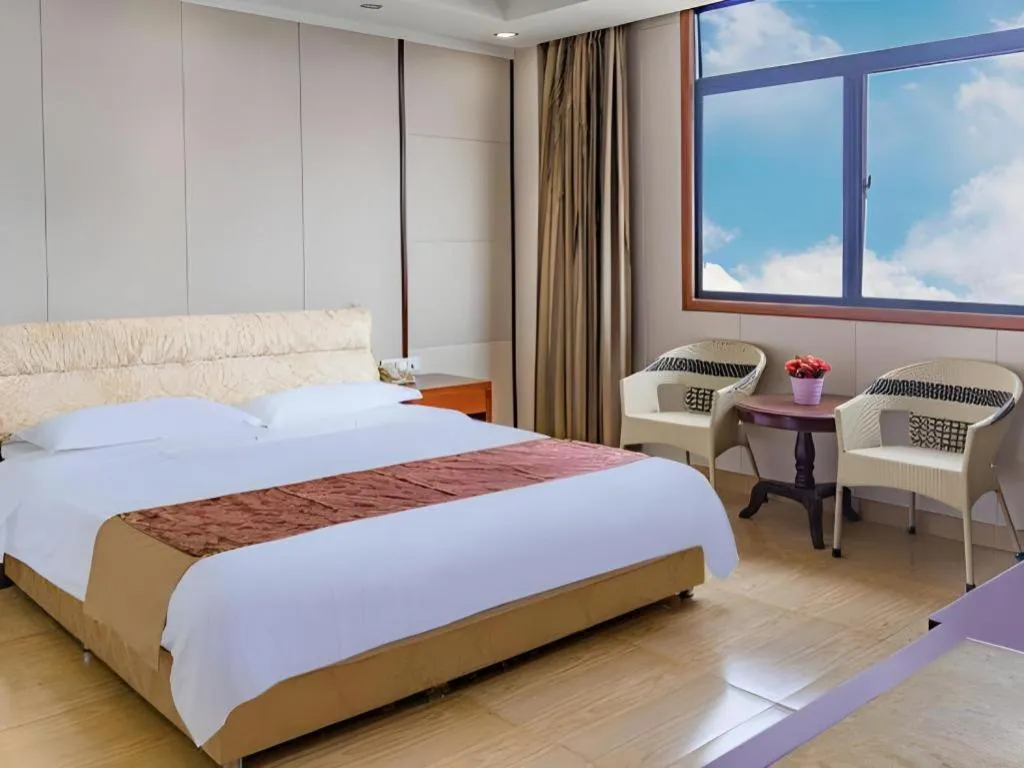 Bed in Jian Guo Grand Hotel