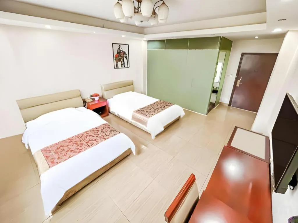 Bed in Jian Guo Grand Hotel