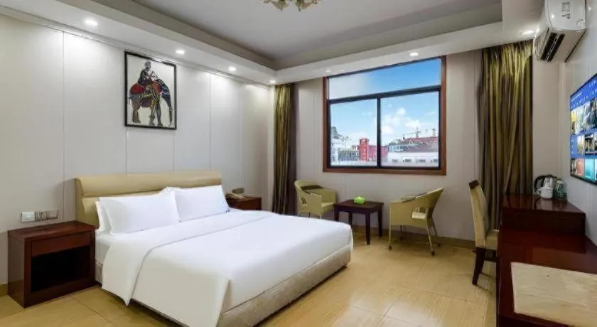 Bed in Jian Guo Grand Hotel