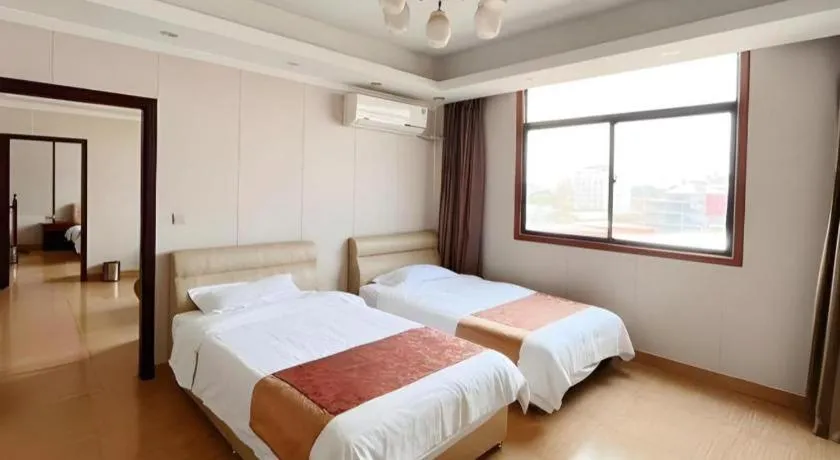 Bed in Jian Guo Grand Hotel