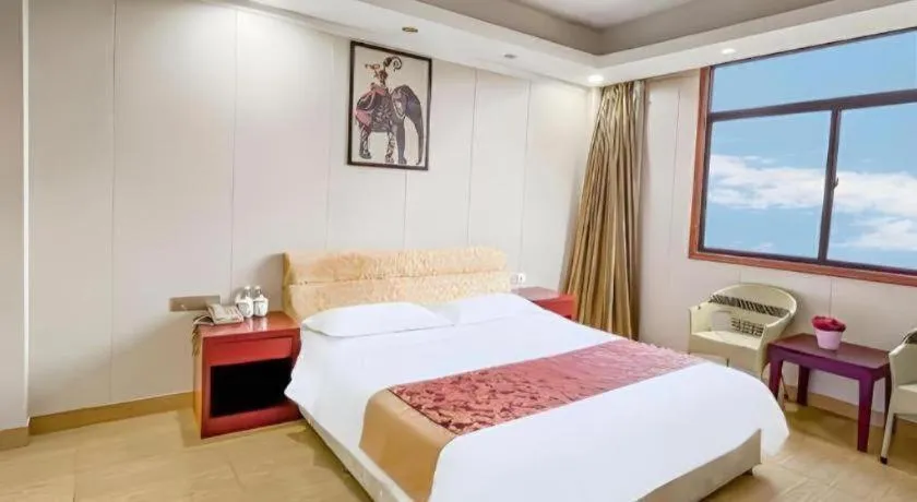 Bed in Jian Guo Grand Hotel