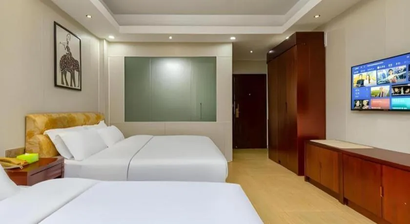 Bed in Jian Guo Grand Hotel