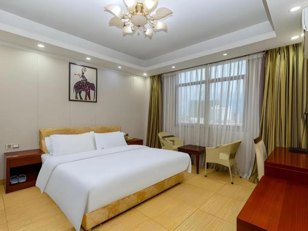 Bed in Jian Guo Grand Hotel