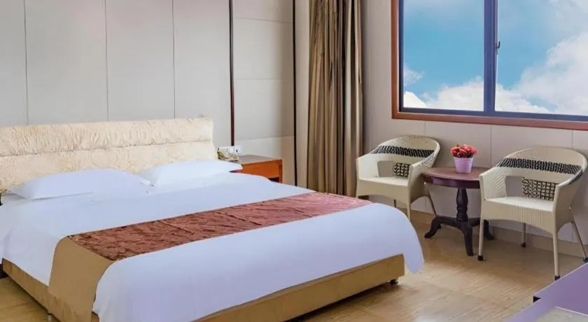 Bed in Jian Guo Grand Hotel