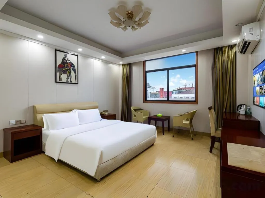 Bed in Jian Guo Grand Hotel