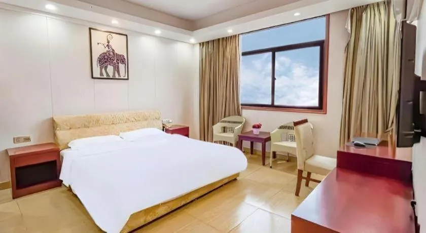 Bed in Jian Guo Grand Hotel