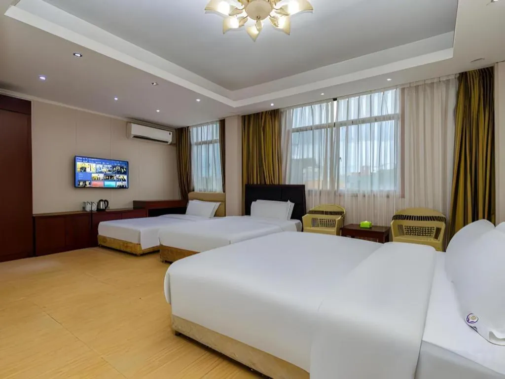 Bed in Jian Guo Grand Hotel