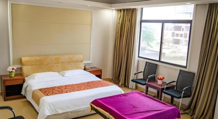 Bed in Jian Guo Grand Hotel