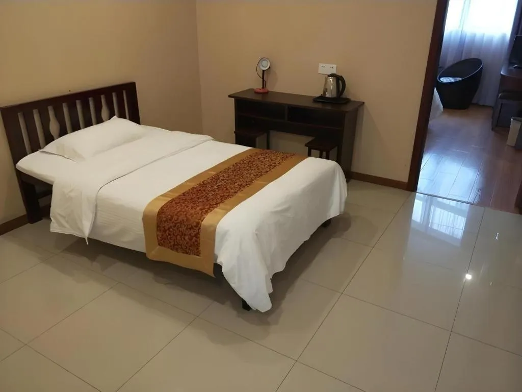 Bed in GreenTree Inn Shanghai Sheshan national tourist resort Express Hotel