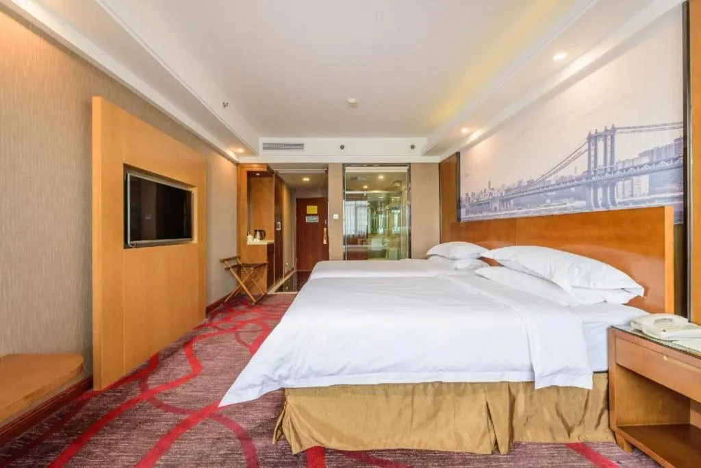 Bed in Vienna Classic Hotel Guilin Quanzhou Central Square