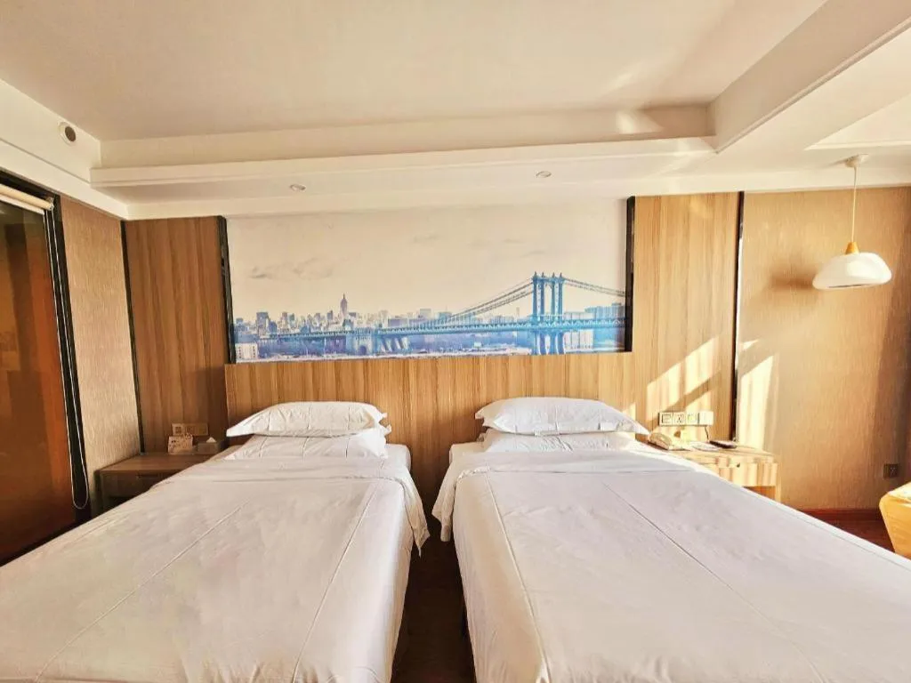 Bed in Vienna Classic Hotel Guilin Quanzhou Central Square