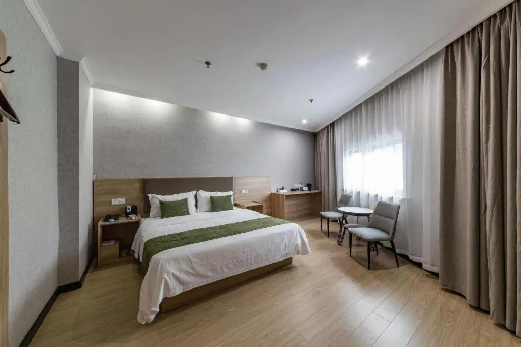 Bed in GreenTree Inn Jiangsu Suzhou Kunshan Beimen Road Express Hotel