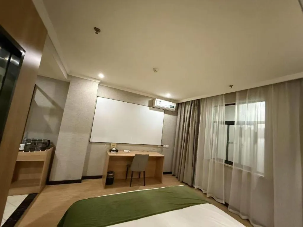 Bed in GreenTree Inn Jiangsu Suzhou Kunshan Beimen Road Express Hotel