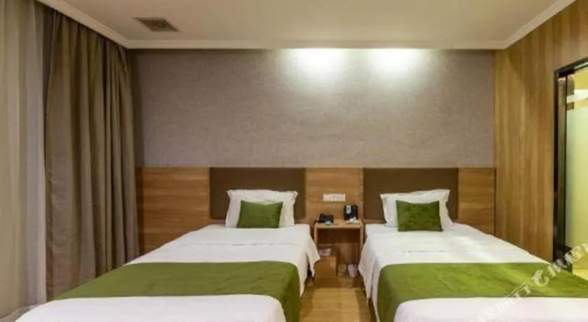 Bed in GreenTree Inn Jiangsu Suzhou Kunshan Beimen Road Express Hotel