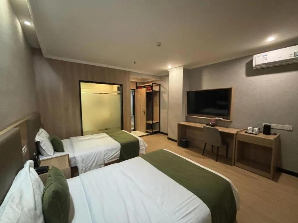 Bed in GreenTree Inn Jiangsu Suzhou Kunshan Beimen Road Express Hotel