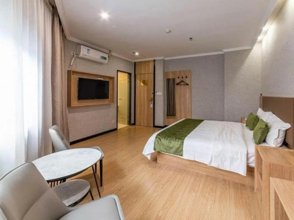Bed in GreenTree Inn Jiangsu Suzhou Kunshan Beimen Road Express Hotel