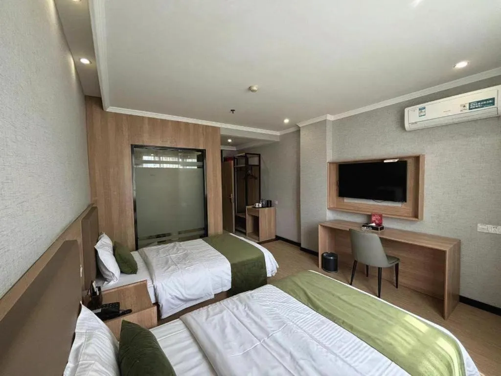Bed in GreenTree Inn Jiangsu Suzhou Kunshan Beimen Road Express Hotel