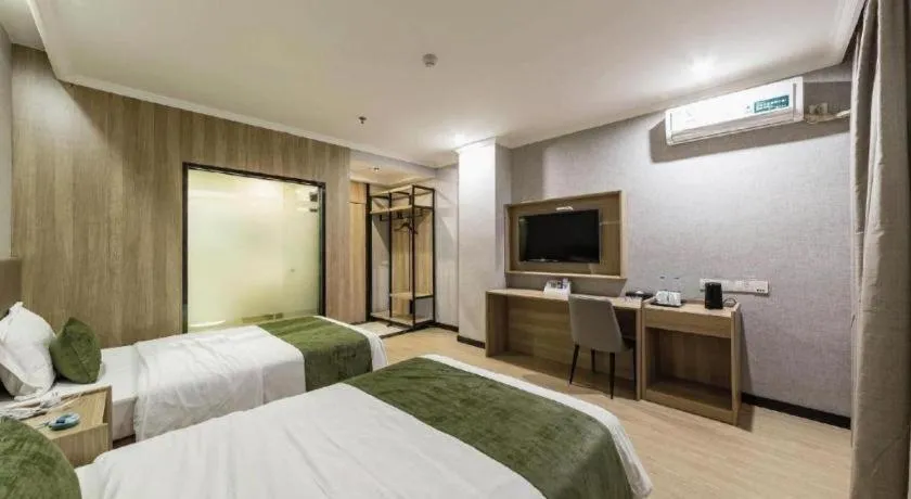 Bed in GreenTree Inn Jiangsu Suzhou Kunshan Beimen Road Express Hotel