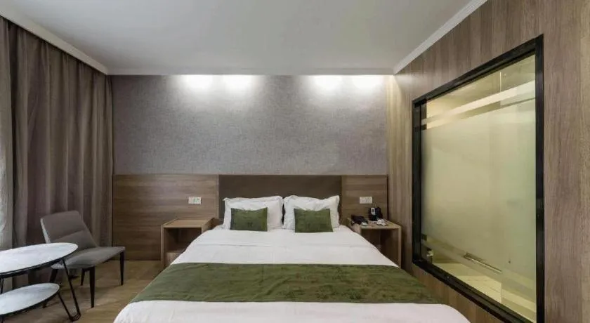 Bed in GreenTree Inn Jiangsu Suzhou Kunshan Beimen Road Express Hotel
