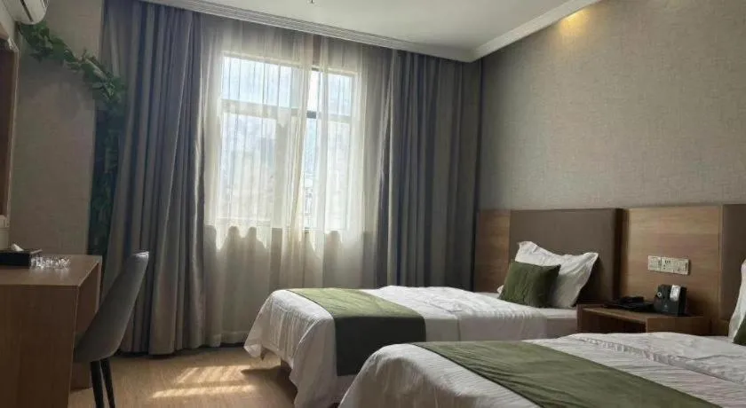 Bed in GreenTree Inn Jiangsu Suzhou Kunshan Beimen Road Express Hotel