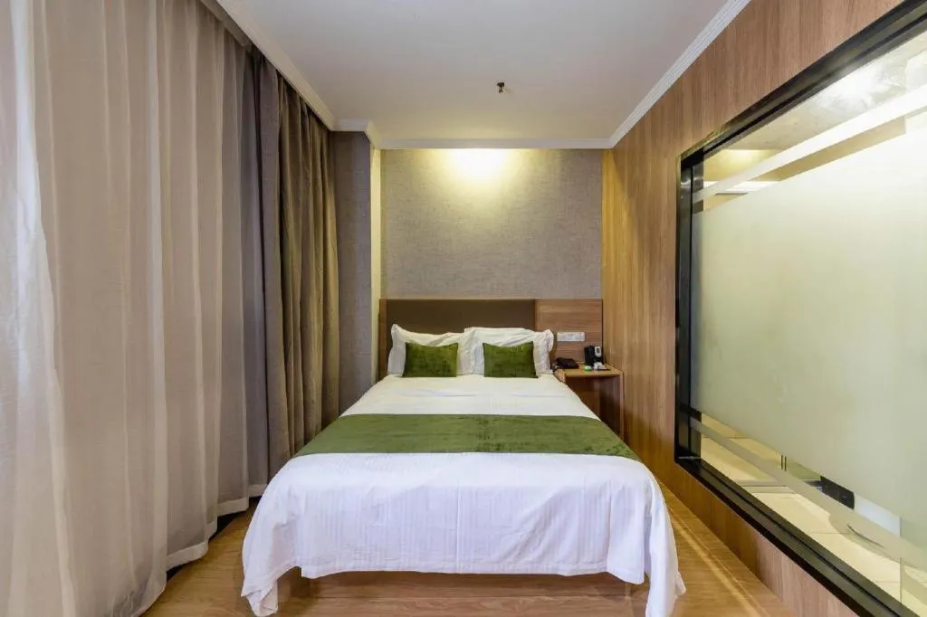Bed in GreenTree Inn Jiangsu Suzhou Kunshan Beimen Road Express Hotel