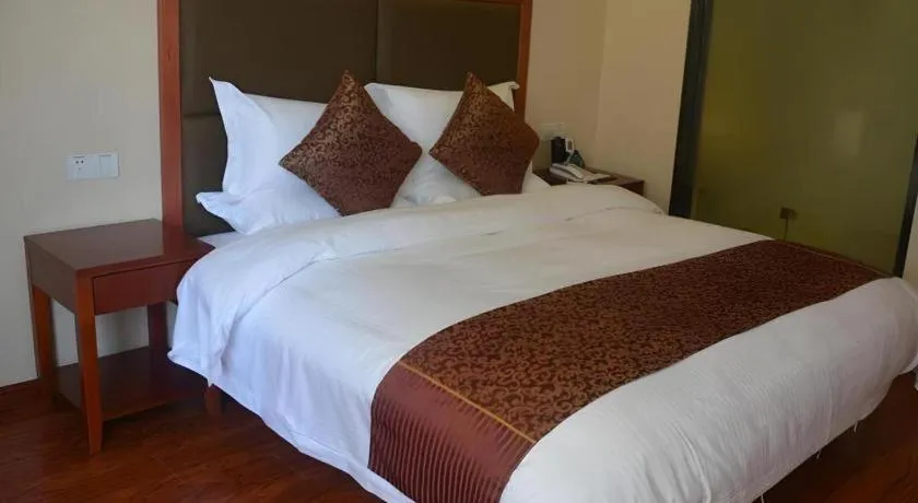 Bed in GreenTree Inn Jiangsu Suzhou Kunshan Beimen Road Express Hotel
